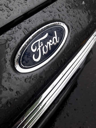 Milan, Italy - December 2, 2020 - Coat of arms and logo on the carのeditorial素材