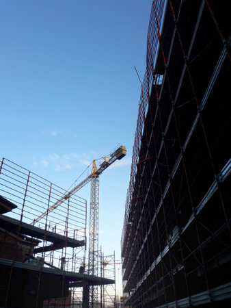Work in progress on the construction site in winter - business
