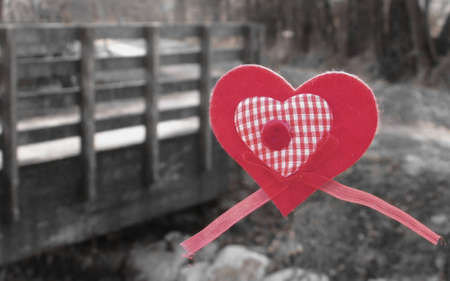 A red heart in a winter landscapeの写真素材