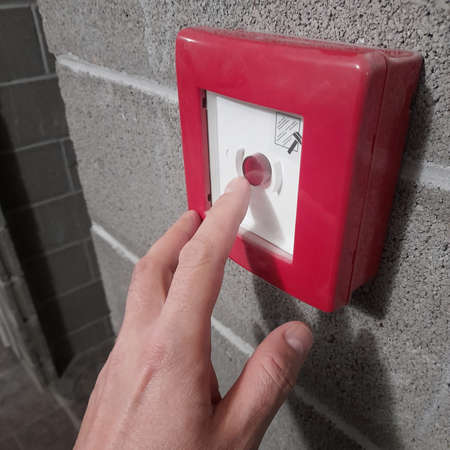 Press the Fire alarm - safety in public placesの写真素材