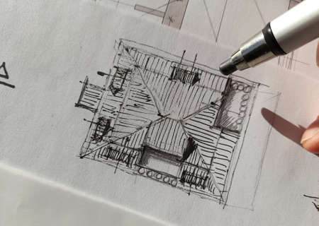 Architect who designs freehand in his studioの写真素材