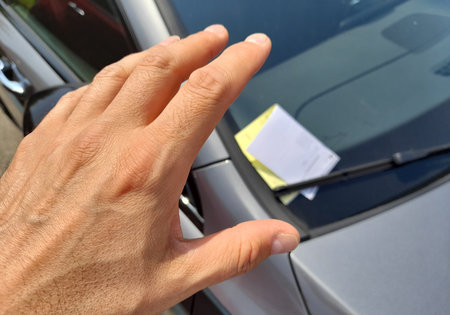 Fine on the windshield of the car for a parking ban
