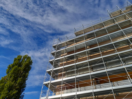 Work in progress on the construction site in the autumn seasonの写真素材