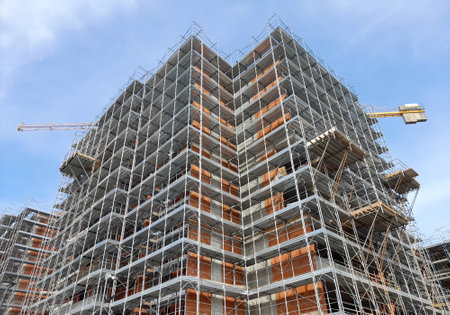 Work in progress on the construction site to build new buildingsの写真素材