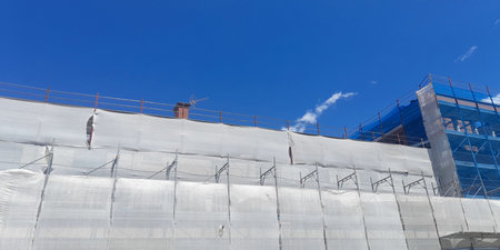 Work in progress on a construction site in summerの写真素材