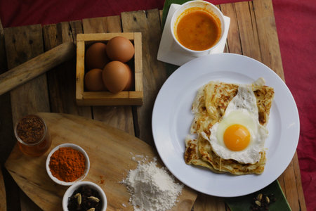 prata canai style  pancakes with fried egg on top, Thai food style.の写真素材