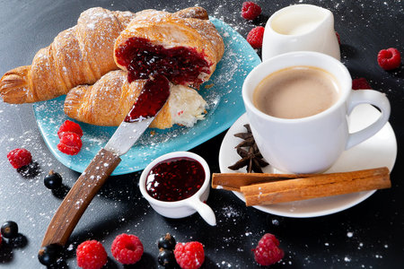 delicious Breakfast with croissants jam and hot coffee. morning mood