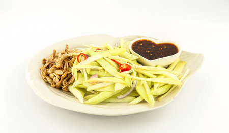 Mango salad a delicious and famous vegetable appetizer from Thailand の写真素材