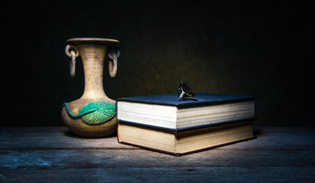 Beautiful still life with Glasses and booksの写真素材