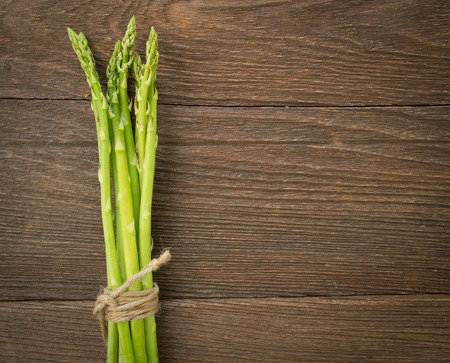 asparagus on wood backgroundの写真素材