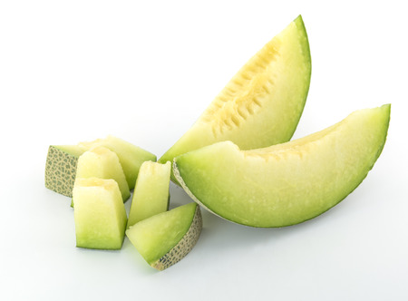 Sliced Cantaloupe melon Isolated on White Backgroundの写真素材