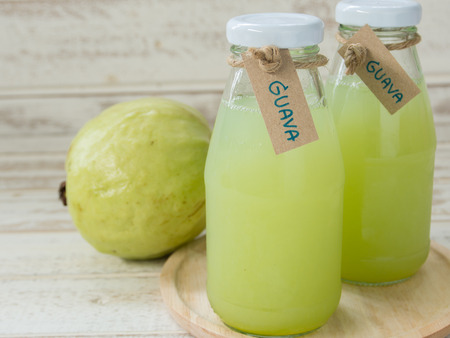 Fresh guava juice in a bottleの写真素材