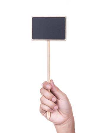Hand holds a banner on a white background.の写真素材