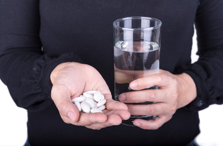 patient need medicine ,women and pill on white background