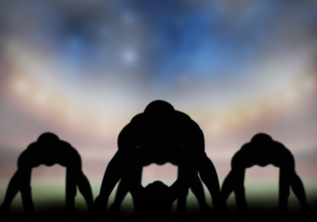American football player silhouette playing in the field.の写真素材