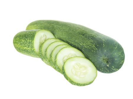 Fresh cucumber and slices on white background.の写真素材