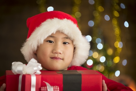 Children are a gift received from Santa Cross. - Christmas day concept. Soft focus.の写真素材