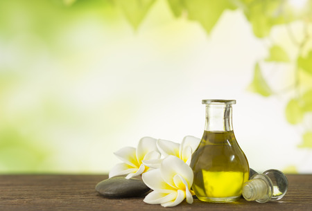 Aroma oil massage  with frangipani flower and natural background. Spa concept.の写真素材