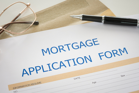 Mortgage loan agreement application form on desk. top view. view from above.の写真素材