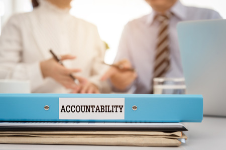Accountability document file put on the table in the meeting room.の写真素材