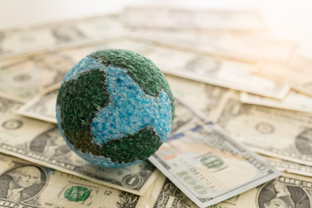 global money, Mock up globe on dollar banknote. concept of foreign exchange market, finance and banking international.の写真素材