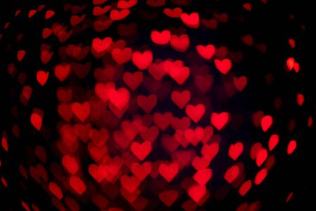 Heart-shaped bokeh with darkの写真素材
