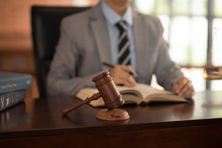 Judge gavel with male judge judiciary working at courtroom. Justice Law Legal concept.
