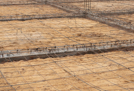 Wires to reinforcement steel bars prior to pouring concrete.の写真素材