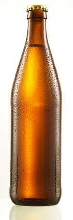 bottle of beer with drops isolatedの写真素材