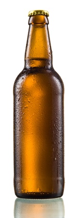 Bottle of beer with drops isolated on whiteの写真素材