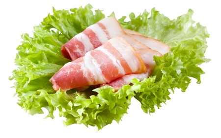 fresh bacon on salad leavesの写真素材