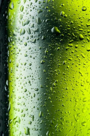  Green bottle with drops  Abstract backgroundの写真素材
