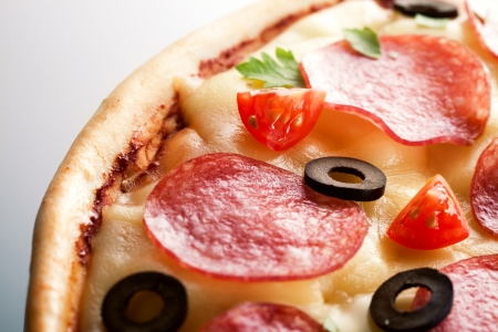 Pizza with salami  macroの写真素材