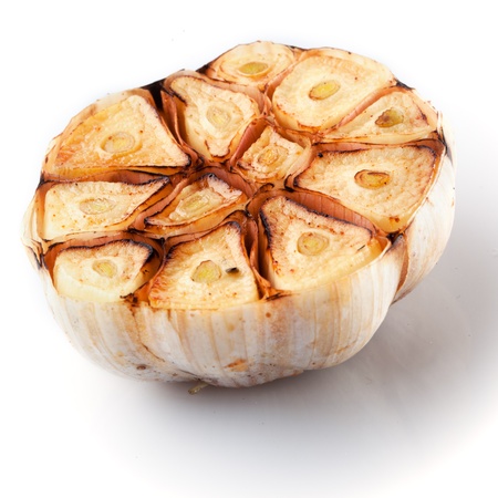 grilled garlic isolated on white backgroundの写真素材