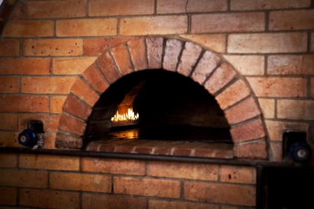 A traditional oven for cooking and baking pizza  の写真素材