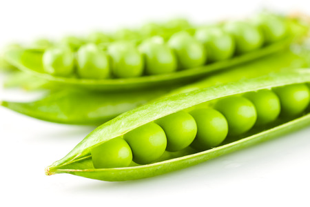 Fresh peas isolated on white backgroundの写真素材