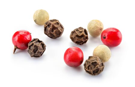 Peppercorns mix. Black, red and white peppercorns isolated on white. macro. Full depth of field.の写真素材
