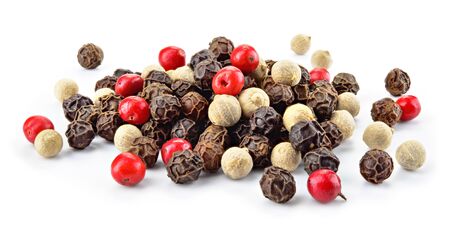 Mix of different peppers. Black, red and white peppercorns isolated on white background. Heap of spice. Full depth of field.の写真素材