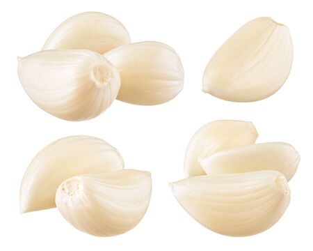 Garlic cloves isolated on whiteの写真素材