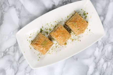 Traditional turkish dessert baklava with cashew, walnuts. Homemade baklava with nuts and honey.の写真素材