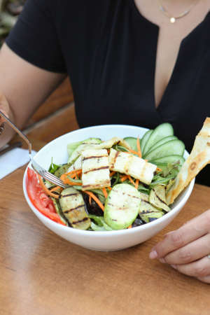 Fresh salad plate with mixed greensの写真素材