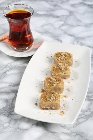 Traditional turkish dessert baklava with cashew, walnuts. Homemade baklava with nuts and honey.