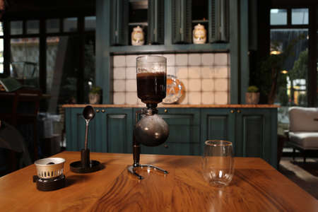 barista brewing coffee in the coffee roomの写真素材
