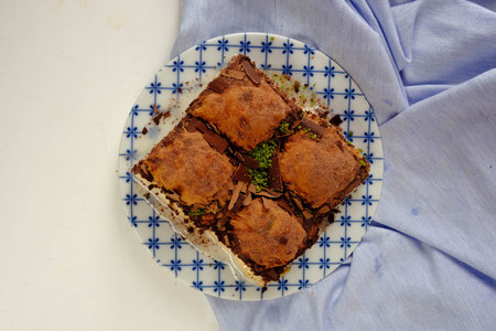 Traditional turkish dessert baklava with cashew, walnuts. Homemade baklava with nuts and honey.