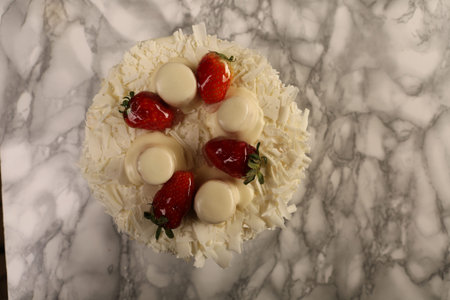 Board with delicious cake on table