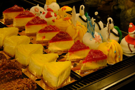 Board with delicious cake on table