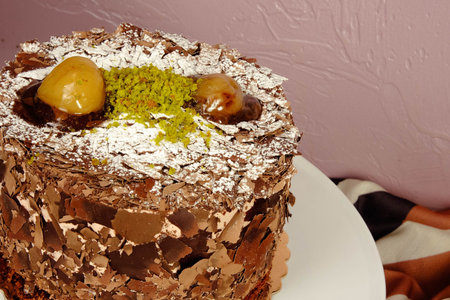 Board with delicious cake on table