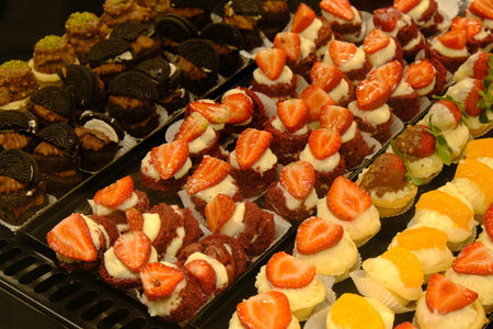 Board with delicious cake on table