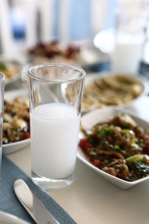 Turkish and Greek Traditional Dinning Table with Special Alcohol Drink Raki. Ouzo and Turkish Raki...