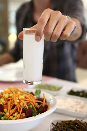 Turkish and Greek Traditional Dinning Table with Special Alcohol Drink Raki. Ouzo and Turkish Raki...